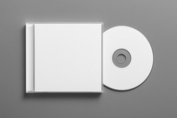 CD and jewel case: A minimalist product shot of a blank CD resting beside its jewel case. The composition is clean and modern. Perfect for design projects.