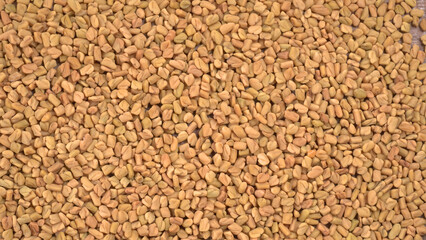 Methi or fenugreek seeds with methi leaves.Methi seeds is good for health.
