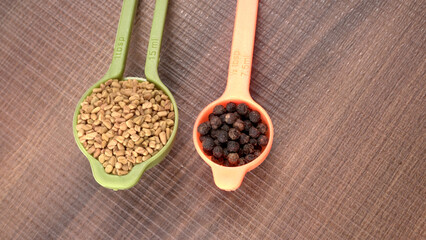 Methi or fenugreek seeds with methi leaves.Methi seeds is good for health.
