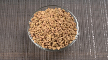 Methi or fenugreek seeds with methi leaves.Methi seeds is good for health.
