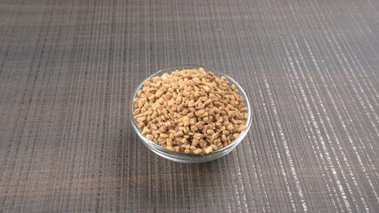 Methi or fenugreek seeds with methi leaves.Methi seeds is good for health.
