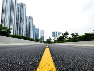 Fototapeta premium straight road leading to a modern cityscape