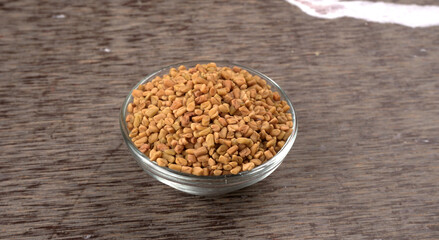 Methi or fenugreek seeds with methi leaves.Methi seeds is good for health.
