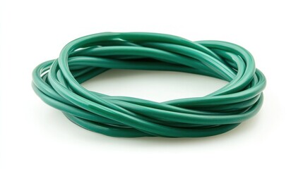 Naklejka premium Closeup of an intricately coiled and twisted bundle of green electric cables or wires creating an abstract swirling pattern of shapes textures and interconnected lines