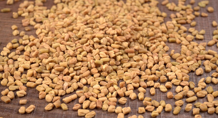 Methi or fenugreek seeds with methi leaves.Methi seeds is good for health.
