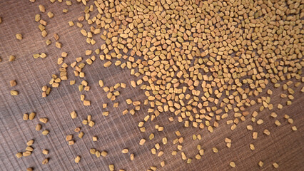 Methi or fenugreek seeds with methi leaves.Methi seeds is good for health.
