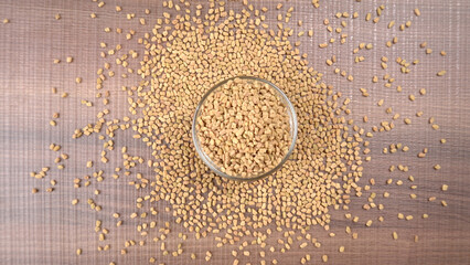 Methi or fenugreek seeds with methi leaves.Methi seeds is good for health.
