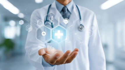 Male doctor in a white coat and stethoscope, standing in a modern hospital