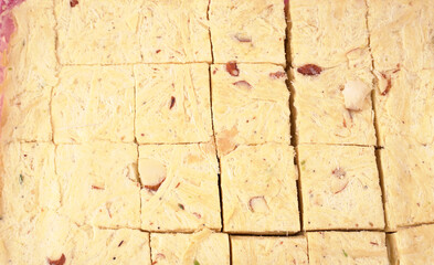 Patisa / Soan Papdi is a popular Indian cube shape flaky/crispy dessert. 
