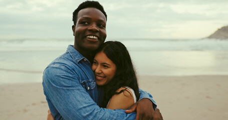 Hug, smile and date with interracial couple at beach for romantic vacation, travel adventure and...