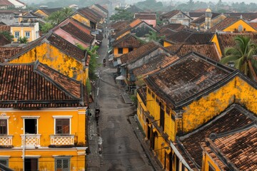 Colorful rooftops line a charming street in a historic town.