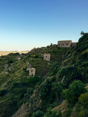 Fototapeta premium abandoned village on the green hill