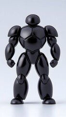 A sleek, black, stylized robot figure with a rounded, smooth design, standing in a neutral pose