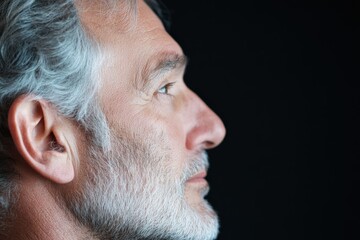 Fototapeta premium Profile of thoughtful older man