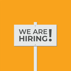 Minimalist We Are Hiring recruitment template on a bold yellow background, featuring a signboard. Ideal for job vacancy announcements posts, and team hiring campaigns.