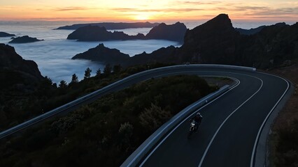 Motorcycle Rider Driving in High Mountain Landscape, Madeira Island , Portugal.