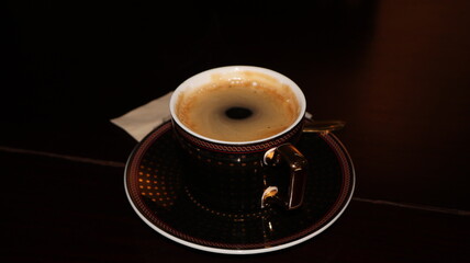 Swirling Crema on Freshly Brewed Coffee