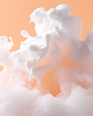 Abstract image of a white, creamy substance exploding against a peach background, creating a dynamic, almost cloud-like formation with various textures and shapes