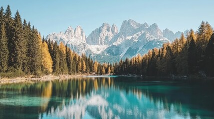 Fototapeta premium Majestic mountains reflect in tranquil alpine lake.