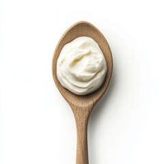 Creamy yogurt in a wooden spoon