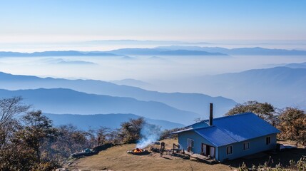 High-altitude mountain cabin nestled amongst misty peaks