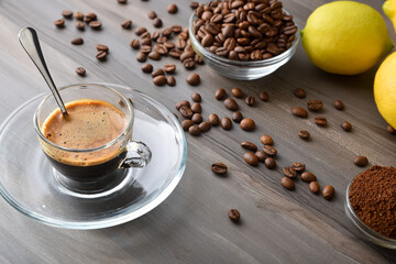 Coffee on wooden table with deco elevated view