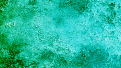 A close up of a green wall with a fluid aqua pattern resembling liquid art.A close up of a green wall with a fluid aqua pattern resembling liquid art. Striped Teal Mint Green Ombre Grunge Texture Back