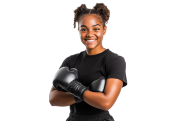 Portrait of a smiling African American teenage girl wearing boxing gloves, ready for training, isolated on transparent background
