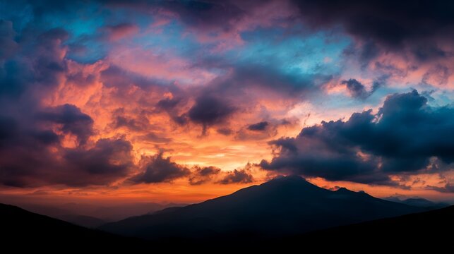 Spectacular sunset sky painting the mountain range with vibrant colors