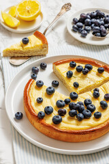 Cheesecake with blueberries sliced on a plate
