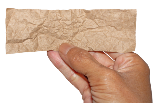 Man Hand Holding Torn Brown Crumpled Paper Texture Pieces on Transparent Background. Ideal for Text Space or Creative Project.