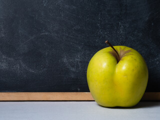 Apple for teacher with chalk board background