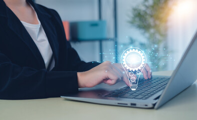 Hand of  holding illuminated light bulb, Idea innovation and inspiration concept.  creativity with bulbs that shine glitter, Concept for success.