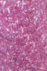 Lean minced beef sealed in a vacuum packed plastic wrap. Fresh meat in packaging background concept.