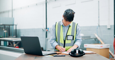 Engineer, laptop and writing in factory for manufacturing, planning and admin checklist. Woman,...