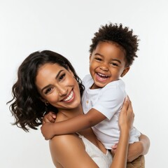Mother and son share a moment of pure joy, their radiant smiles lighting up the frame.