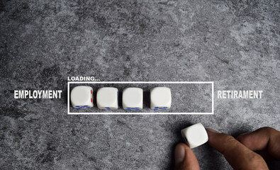 Hand places a wooden cubes or dice to the loading bar transition of career timeline from employment...