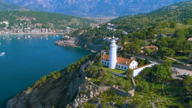 Enjoy a breathtaking and scenic coastal view of a charming Mediterranean town by the sea. Port of Soller in Mallorca 
