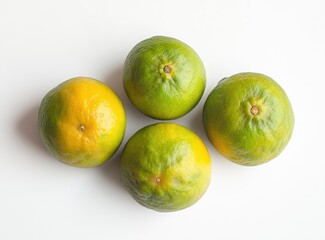 Green Oranges on White Background