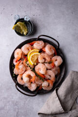 Frozen uncooked prawns or shrimps with lemon