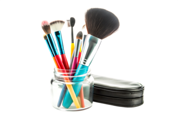 A Colorful Array of Brushes Resting in a Glass Jar Against a Clean White Background. PNG