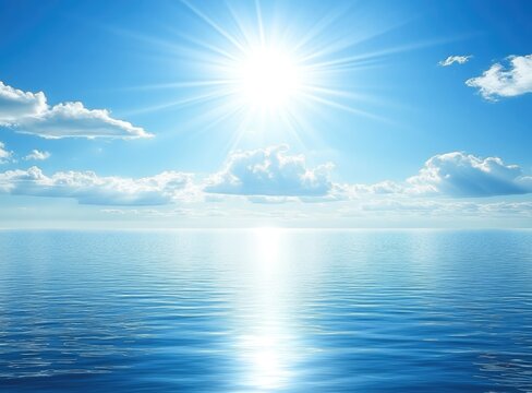 Bright sun shines over a calm ocean with fluffy clouds.  Clear blue sky, reflecting light on the water's surface