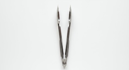 Dark gray kitchen tongs against white background