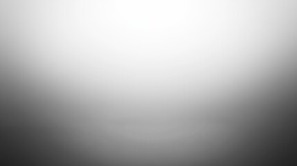 Obraz premium Minimalistic gray gradient background with subtle light effect.