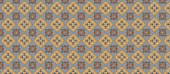  Moroccan style repeating floral geometric pattern with symmetrical motifs in muted reddish-brown and orange-yellow tones