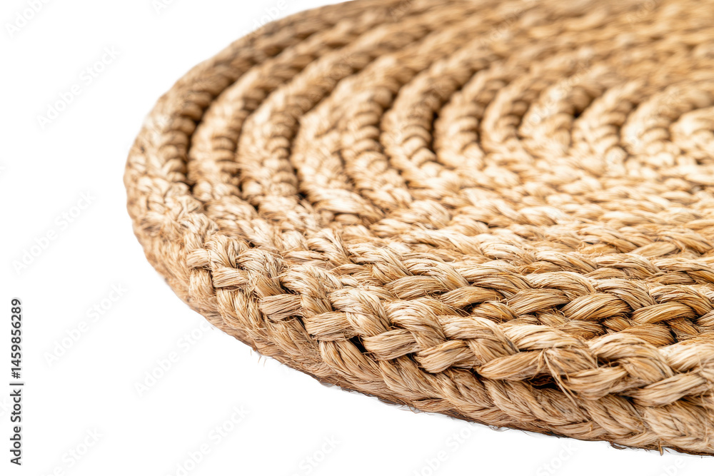 Aufkleber close up view of a woven jute rug showing its texture and circular pattern on a white background