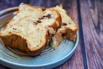  Brioche bread.  Home made easter butter  covered with sugar  on wooden background.