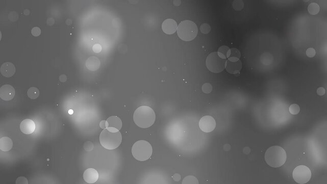 Gradient gray background with blurred white circles suitable for modern design projects, tech presentations, web graphics, and abstract backgrounds.
