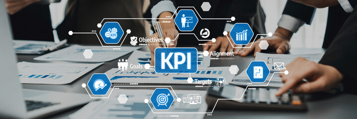 Engage in a business strategy meeting where teams analyze KPI metrics through visual data to enhance performance, set goals, and drive collaborative efforts in the workplace. Amity