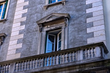 Old classic facade detail with balcony.